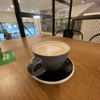 Photo taken at Pallet Coffee Roasters by Pratik G. on 1/21/2022