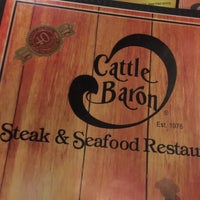 Photo taken at Cattle Baron Steak and Seafood by Amanda B. on 12/20/2016