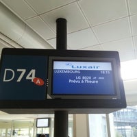Photo taken at Gate D74 by Mario L. on 9/16/2012