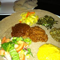 Photo taken at Lesaac Ethiopian Cafe by Kathy J. on 1/30/2014