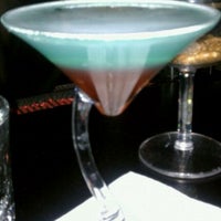 Photo taken at JoJo&amp;#39;s Martini Lounge by Schinika F. on 11/14/2011