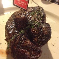 Photo taken at GOODMAN Steak House by Anastasia U. on 9/17/2012