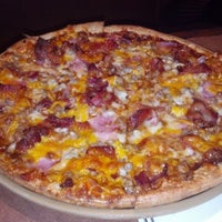Photo taken at Stone Canyon Pizza by Kellie G. on 10/1/2012