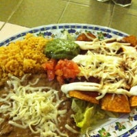 Photo taken at Los Taquitos by Tucker on 12/9/2012