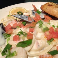 Photo taken at Boston Pizza by Tracy on 1/9/2013