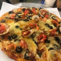 Photo taken at Yellow Cab Pizza Co. by Joey P. on 3/2/2019