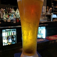 Photo taken at Bottoms Up Sports Bar &amp;amp; Grill by Michael J. on 4/13/2018
