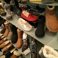 Photo taken at Tip Top Shoes by Burton C. on 1/2/2013