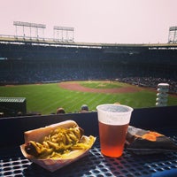 Photo taken at Wrigley Rooftops 1038 by Todd T. on 9/19/2014