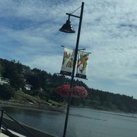 Photo taken at Departure Bay Beach by Kelly on 7/25/2016