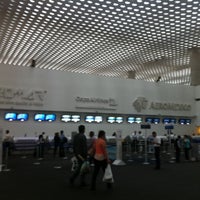 Photo taken at Terminal 2 by Arturo R. on 4/20/2013