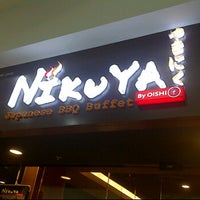 Photo taken at Nikuya by Shine T. on 3/23/2012