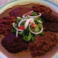 Photo taken at Gojo Ethiopian Restaurant by Lana P. on 10/1/2013