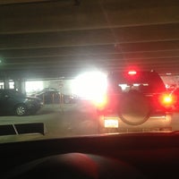 Photo taken at Perry Street Parking Garage by Casey K. on 1/25/2013