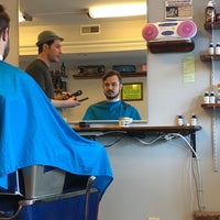 Photo taken at Slade&amp;#39;s Barber Shop by Ravi K. on 3/31/2018