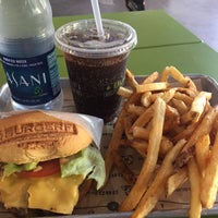 Photo taken at BurgerFi by Charmaine D. on 6/6/2017