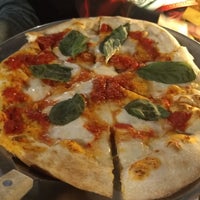 Photo taken at The Rock Wood Fired Pizza by Beth N. on 4/28/2019