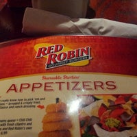 Photo taken at Red Robin Gourmet Burgers and Brews by Scott W. on 3/2/2013