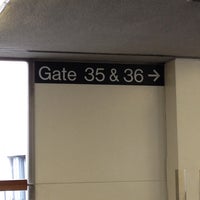 Photo taken at Gate 35 by Michelle R. on 6/7/2014