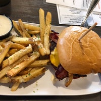 Photo taken at Crave Real Burgers by Tiffany J. on 5/13/2018