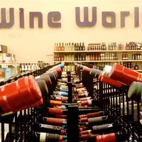 Photo taken at Wine World by Wine World on 10/12/2015