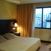 Photo taken at Alhamar Hotel Granada by Maria R. on 12/14/2012
