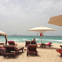 Photo taken at Madinat Jumeirah Private Beach by Ирина Е. on 4/24/2013