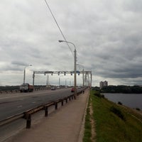 Photo taken at Октябрьский мост by Alex M. on 7/24/2018