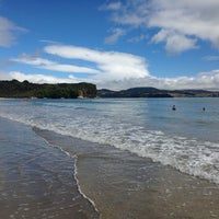 Photo taken at Cooks Beach by Martin E. on 2/7/2014