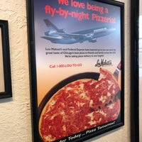 Photo taken at Lou Malnati&amp;#39;s Pizzeria by Eric R. on 3/9/2018