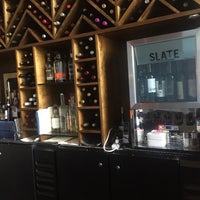 Photo taken at Slate Wine Bar + Bistro by Carol A. on 4/6/2018
