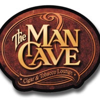 Photo taken at The Man Cave - Cigar &amp;amp; Tobacco Lounge by Becky S. on 6/27/2013