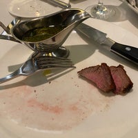 Photo taken at Charlie Palmer Steak by Juan T. on 3/22/2023