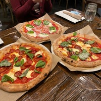 Foto diambil di Rise Pizzeria oleh Stephanie W. pada 3/17/2022