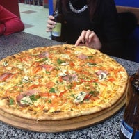 Photo taken at New York Street Pizza by Mariana on 1/17/2013