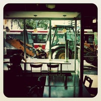 Photo taken at Belljar Cafe by Lisa K. on 10/1/2012