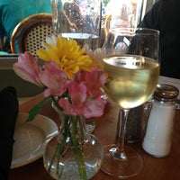 Photo taken at Petite Chou Bistro and Champagne Bar by Rebecca L. on 4/30/2013