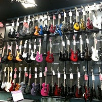 Photo taken at Guitar Center by Mayra A. on 5/27/2013