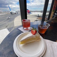 Photo taken at Delta Sky Club by Chas P. on 5/5/2023