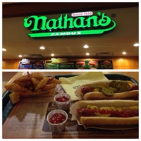 Photo taken at Nathan&amp;#39;s Famous by Tan N. on 12/18/2013