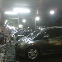 Photo taken at Arema Car Wash by Hendra on 1/6/2013