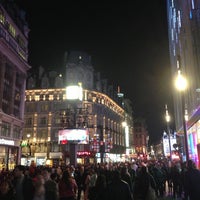 Photo taken at Piccadilly Circus by Bulent P. on 4/20/2013
