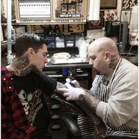 Photo taken at The Chicago Tattoo and Piercing Co. by Allison A. on 2/8/2013