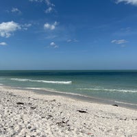 Photo taken at Naples Beach by Grouch F. on 3/30/2022