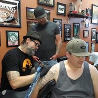 Photo taken at Timeless Tattoo by Dante D. on 6/15/2013