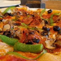 Photo taken at California Pizza Kitchen by Stephan Z. on 5/21/2018