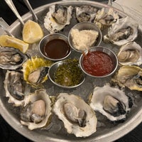 Photo taken at Rustic House Oyster Bar And Grill by Chongho L. on 12/24/2021