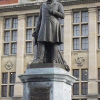 Photo taken at Statue de Pierre-Théodore Verhaegen by Martijn K. on 11/19/2012