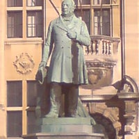 Photo taken at Statue de Pierre-Théodore Verhaegen by Martijn K. on 11/19/2012
