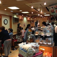 Photo taken at Cafe MILANO by Yoshito H. on 10/17/2012